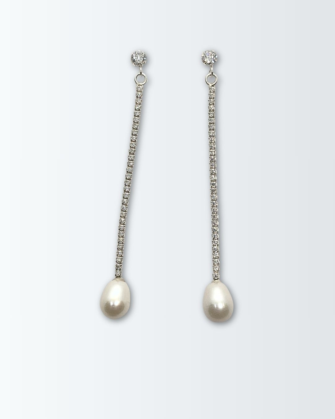 Aros de plata 925 laargos de tira de chatones con circonias y perla de rio en forma de gota Aros de plata 925 laargos de tira de chatones con circonias y perla de rio en forma de gota
